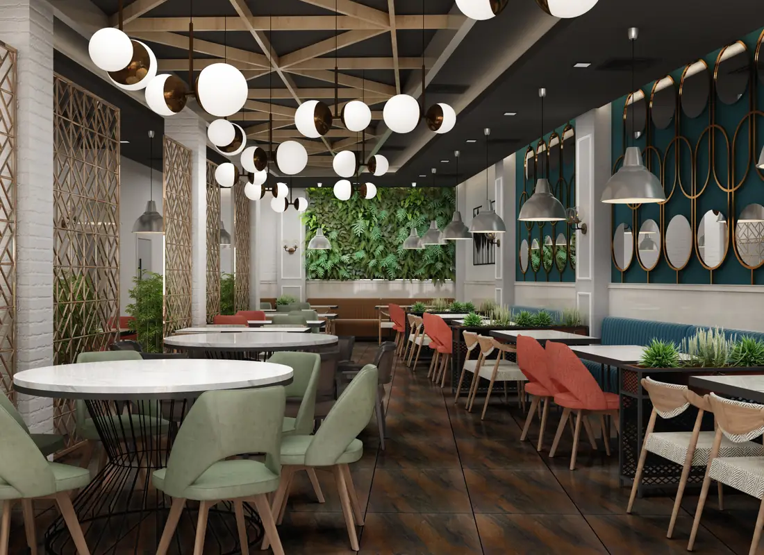 Beyafi Levent restoranı, yeşil bitki duvarı, küre aydınlatmalar ve renkli sandalyeler